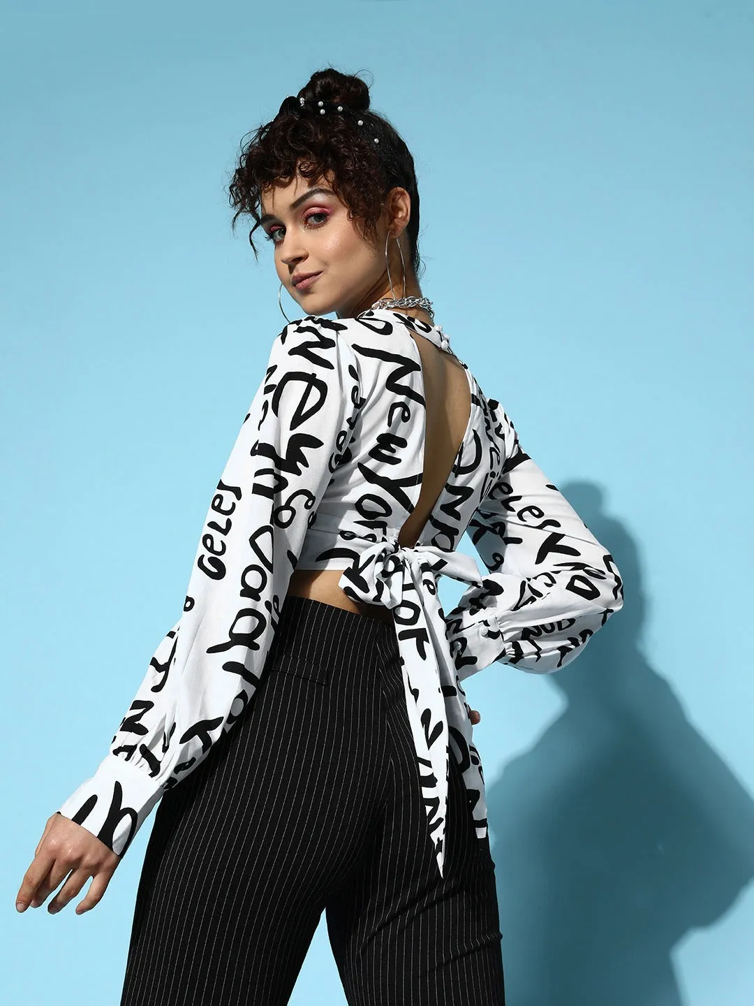 Berrylush Women White & Black Conversational Printed High Neck Front Cutout Styled Tie-Up Back Crop Top