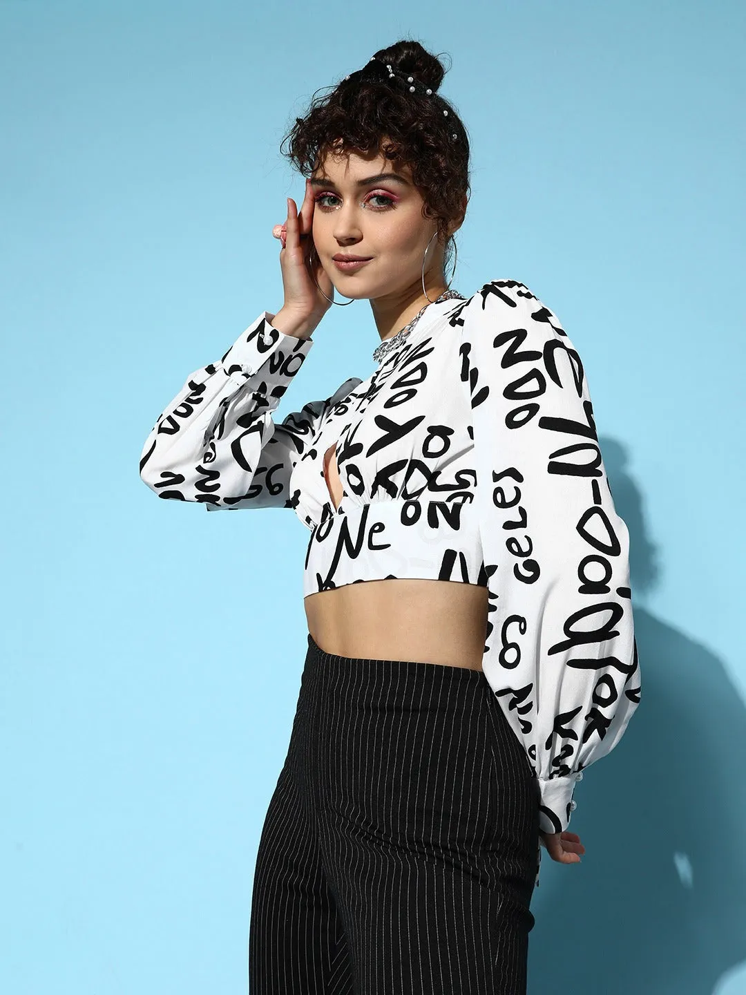 Berrylush Women White & Black Conversational Printed High Neck Front Cutout Styled Tie-Up Back Crop Top