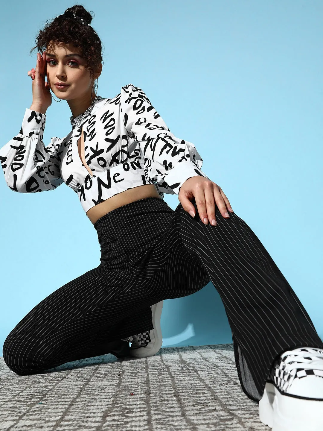 Berrylush Women White & Black Conversational Printed High Neck Front Cutout Styled Tie-Up Back Crop Top