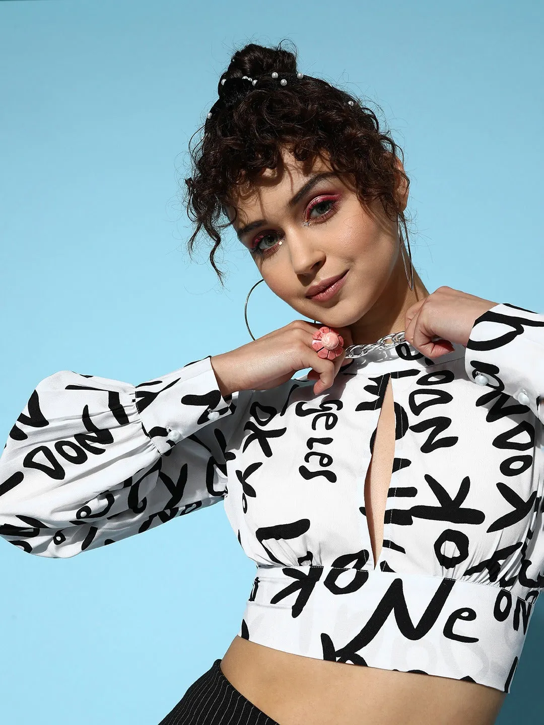 Berrylush Women White & Black Conversational Printed High Neck Front Cutout Styled Tie-Up Back Crop Top